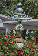 Ceramic Totem Among the Roses
