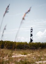 Lighthouse Through the Sea Oats