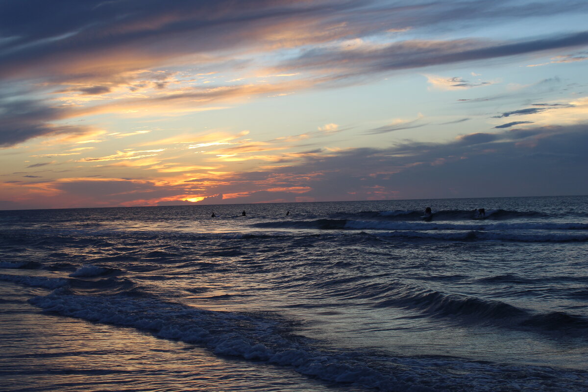 Surfers at Dusk