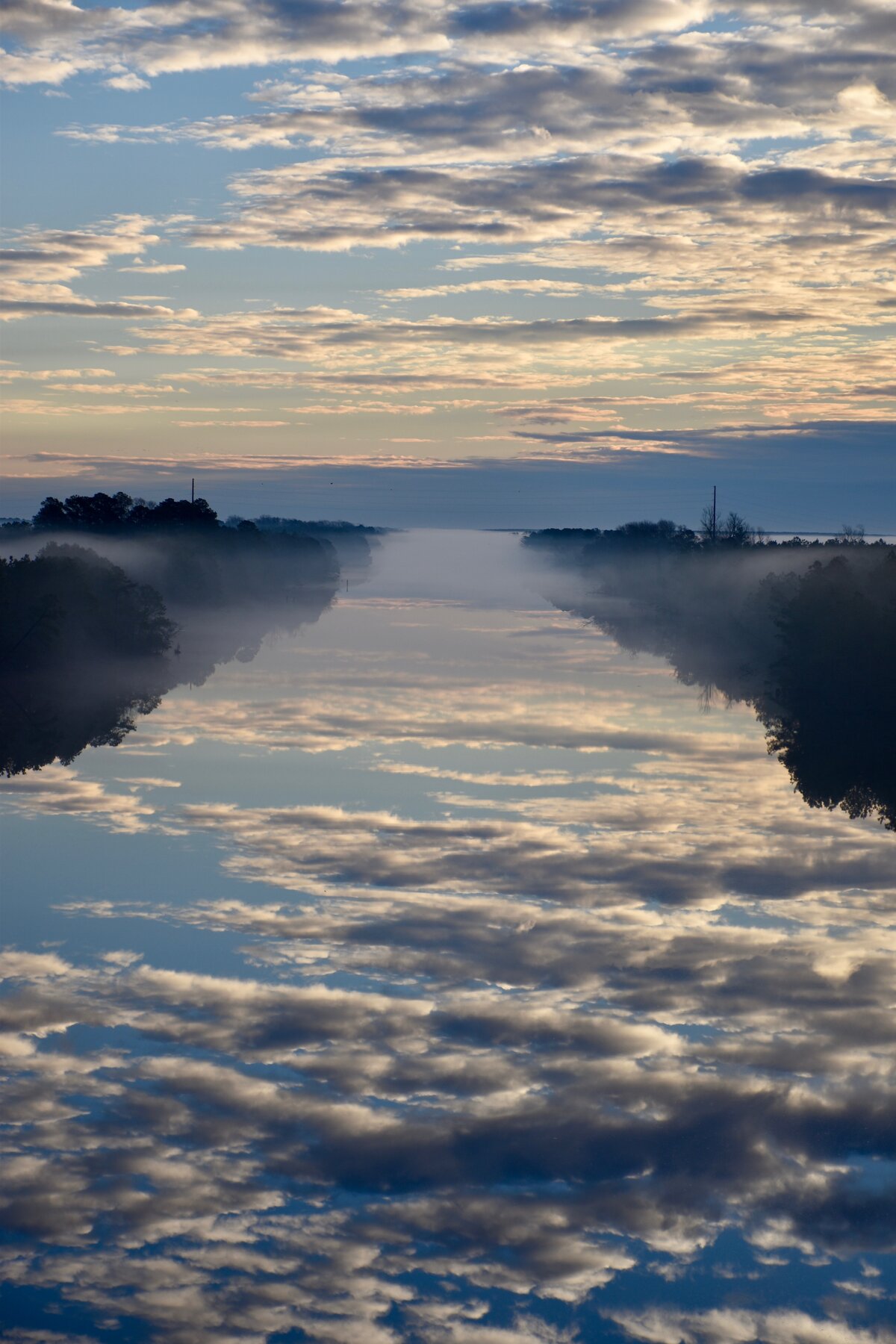 Misty Canal Reflection